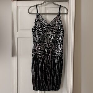 Black dress with silver sequins.